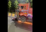 Viral Video Shows Man Standing On Speeding Truck Footboard Inner Ring Road Hyderabad KRJ