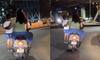 Bengaluru couple rides scooter with child standing on footrest, Internet puzzled; WATCH viral video 