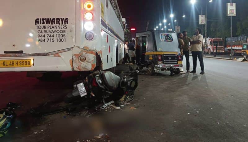 youth died after a scooter rammed into a stopped tourist bus in Kannur