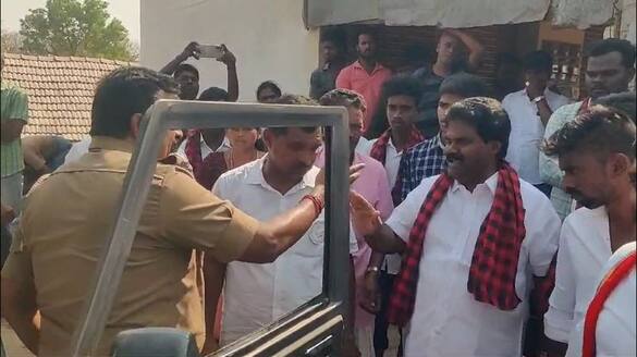 dmk cadres argument with police officers in dharmapuri video goes viral vel