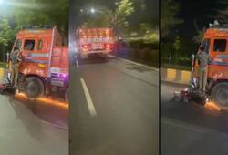 lorry speeding away after accident with passenger in footboard and bike under front tyre 