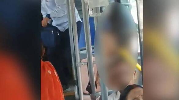woman enters bus wearing bikini trolled video 