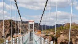 Which is the longest glass sky over bridge in the country Chitrakoot or Kerala? XSMN