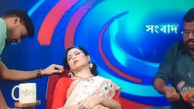 When reporting on West Bengal's heatwave during a live news broadcast, a Doordarshan anchor passes out-rag