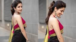 acress Ashika Ranganath stuns in backless blouse and black saree pav