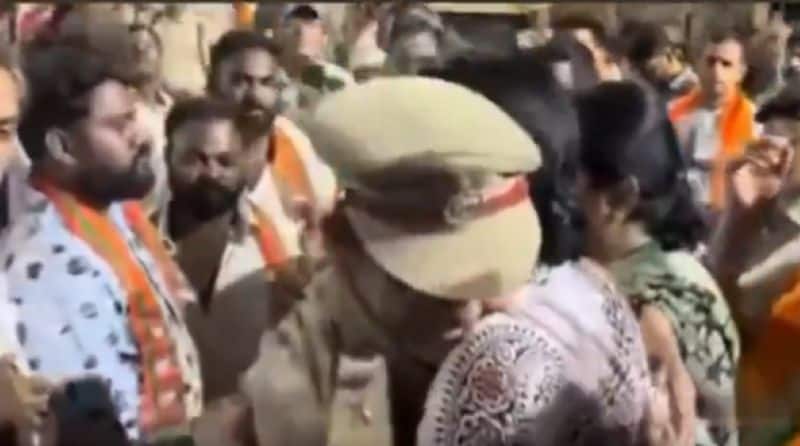 Woman Police Suspended After hugs Hyderabad Lok Sabha BJP Candidate Madhavi Latha AKP
