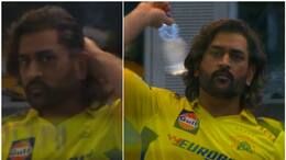 watch video ms dhoni threatens to throw the bottle against cameraman