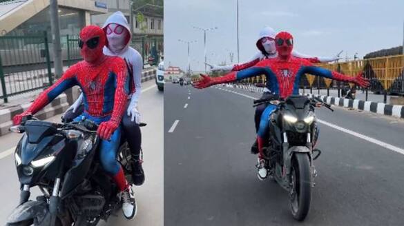 spiderman and spiderwoman bike ride arrested in delhi