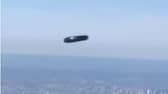 UFO spotted over New York City? Mysterious 'flying cylinder' gliding high in skies sparks speculation (WATCH) snt