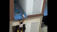 Video of rescue of child who falls from apartment in chennai smp