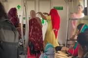women singing and dancing in delhi metro viral video 