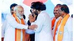 Pawan Kalyan touches PM modi feet during lok sabha election campaign in andhra pradesh gan