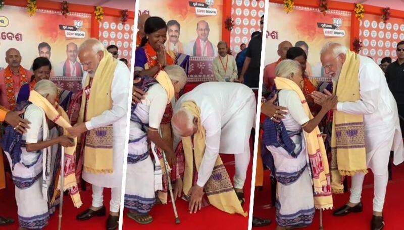 PM Modi bows down to seek blessings from Padma Shri awardee Purnamasi Jani in Odisha | WATCH