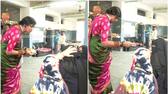 bjp candidate checking muslim womens id card and face at hyderabad polling booth