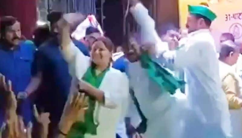 Lalu's son Tej Pratap Yadav pushes party worker on stage while campaigning for Misa Bharti (WATCH)