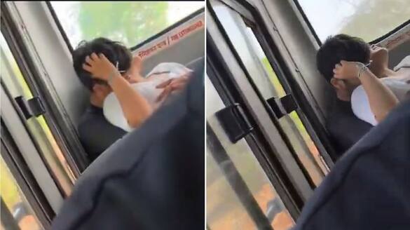 Couple caught romance and kissing in last seat of Public transport bus Odisha video goes viral ckm
