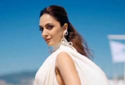   Bollywood actress kiara advani cannes 2024 white satin gown  glamorous dress look photos xbw