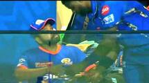 During MI vs LSG 67th IPL Match Fast Bowler Romario Shepherd taking autograph from Rohit Sharma at Wankhede Stadium rsk