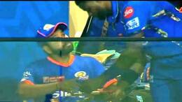 During MI vs LSG 67th IPL Match Fast Bowler Romario Shepherd taking autograph from Rohit Sharma at Wankhede Stadium rsk