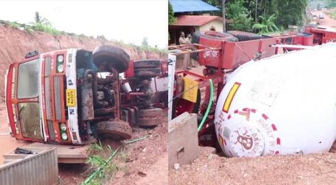 Gas tanker lorry overturns mangalapuram in National Highway lifted up by crane