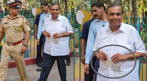 Billionaire Mukesh Ambani simplicity carries Aadhaar card in plastic packet at polling station san