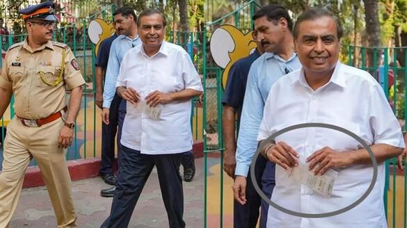Billionaire Mukesh Ambani simplicity carries Aadhaar card in plastic packet at polling station san