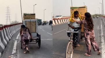  WATCH! Woman helps rickshaw driver with heavy load on bridge, internet reacts to heartwarming gesture NTI