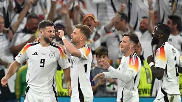 germany into the quarter finals of euro cup after beating denmark
