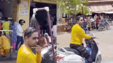 WATCH: Jodhpur Man Adds Small Shower to Scooter to Stay Cool During Heat NTI