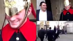 Rare moment shows Buckingham Palace visitor cracking Royal Guard's stiff upper lip! (WATCH) AJR