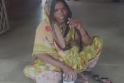 woman holding bottle of poison protested in front of sindagi Tahasildar's office in vijayapura grg 