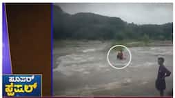 boys in middle of flood of river at kerala nbn