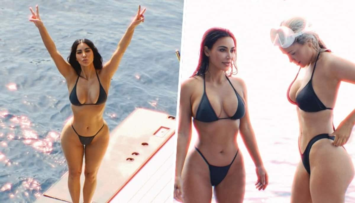 Kim Kardashian SEXY pictures: American socialite takes a swim wearing black bikini, shows off HOT figure