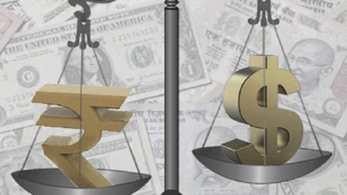 Rupee rises 81 paise in afternoon trade after RBI announcement kpm Rupee rises 81 paise in afternoon trade after RBI announcement kpm