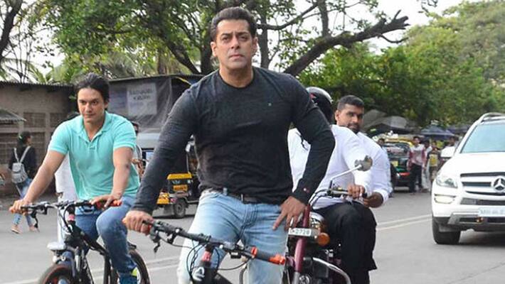 Samlan Khan cycling on road to reach set Samlan Khan cycling on road to reach set