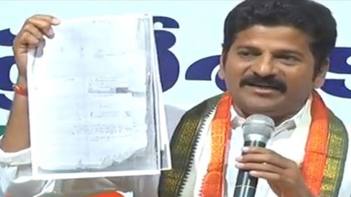 TPCC Chief Revanth Reddy sensational comments on kokapet land sales lns TPCC Chief Revanth Reddy sensational comments on kokapet land sales lns