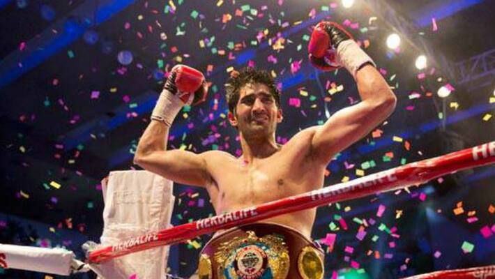 Indian Boxing Star Vijender Singh beats Mike Snider to clinch 11th consecutive victory Indian Boxing Star Vijender Singh beats Mike Snider to clinch 11th consecutive victory