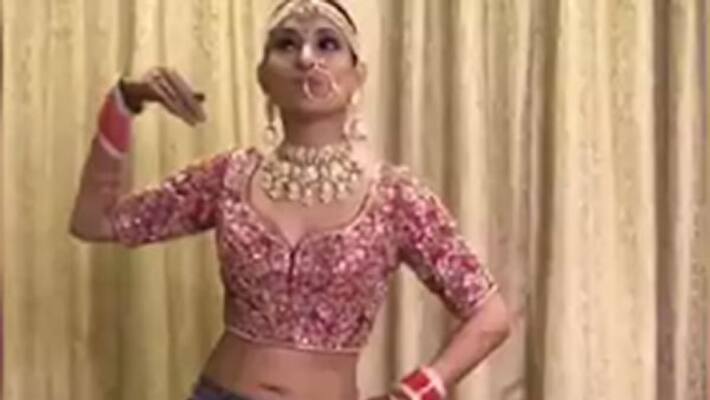 Indian bride does belly dance on her wedding day Video Indian bride does belly dance on her wedding day Video
