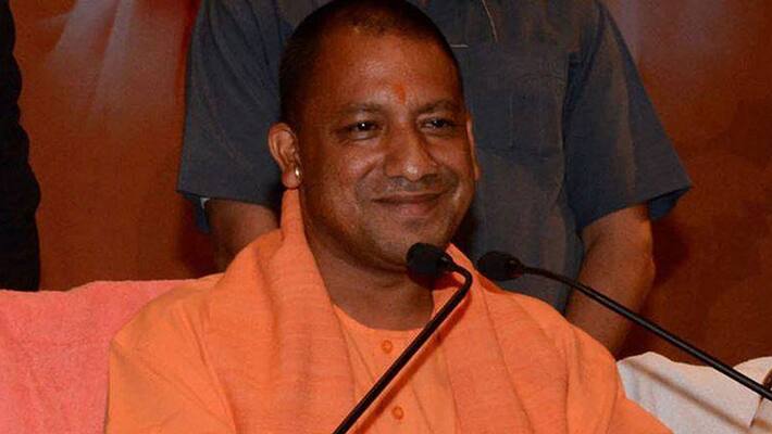 UP CM Shares Food with Dalits in Gorakhpur UP CM Shares Food with Dalits in Gorakhpur