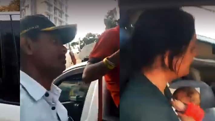 Viral video Mumbai Police tows away car with mother feeding baby in the backseat Viral video Mumbai Police tows away car with mother feeding baby in the backseat