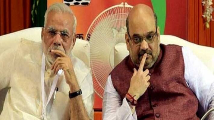 PM Modi Amit Shah in huddle over lockdown strategy PM Modi Amit Shah in huddle over lockdown strategy