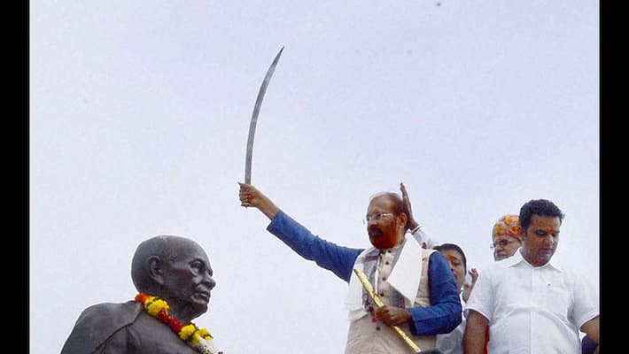 Controversial ex-cop Vanzara uses toy pistol to garland Sardar Patel Controversial ex-cop Vanzara uses toy pistol to garland Sardar Patel
