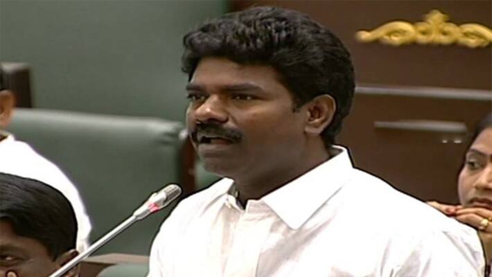 Farmer falls on TRS MLA Rasamai Balakishan feet akp Farmer falls on TRS MLA Rasamai Balakishan feet akp