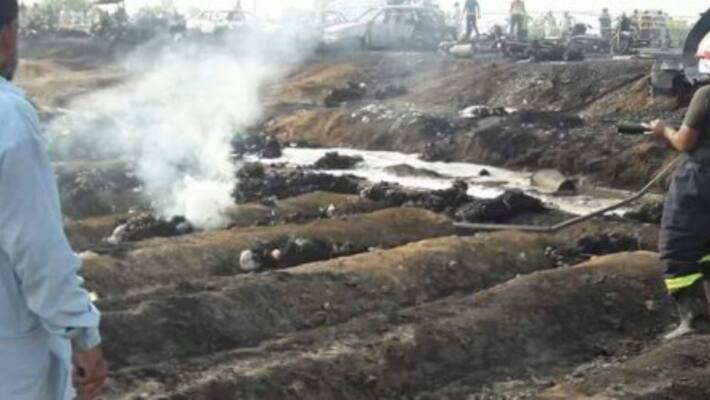 Oil tanker flips and explodes killing over 120 in Pakistan Oil tanker flips and explodes killing over 120 in Pakistan