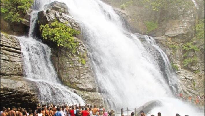 rain in kutralam Waterfalls got water continuously tourists happy rain in kutralam Waterfalls got water continuously tourists happy