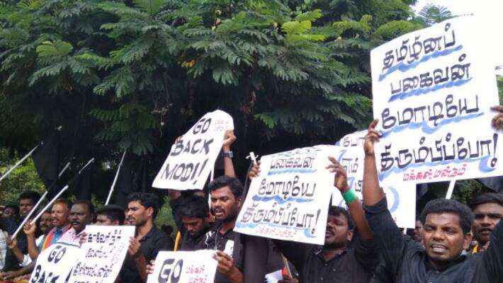 pm arrived chennai and protest against pm modi chennai trip pm arrived chennai and protest against pm modi chennai trip