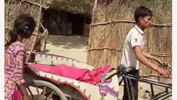 promise kept: husband drags wife's dead body for 45 kilometers in a rickshaw. promise kept: husband drags wife's dead body for 45 kilometers in a rickshaw.