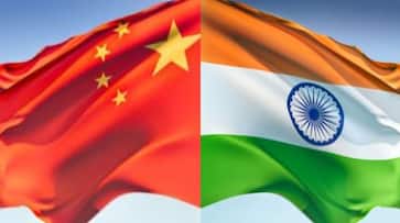 China calls on India, Pakistan to resolve disputes through talks as Qureshi meets Wang