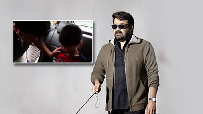 Mohanlal left teary eyed after visually impaired fan kisses him Mohanlal left teary eyed after visually impaired fan kisses him