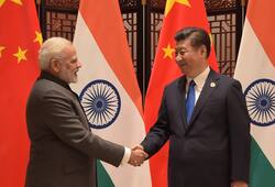 China tries to rebuild bridge with India